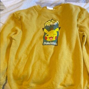Pokemon Yellow Crewneck Sweater Vibrant Graphic Design